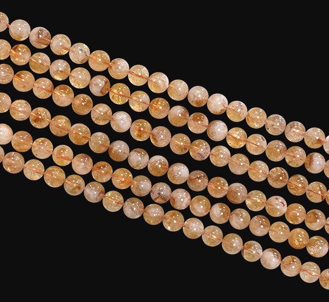 Podgrzewany cytryn z koralikami o średnicy 6 mm na drucie o długości 40 cm