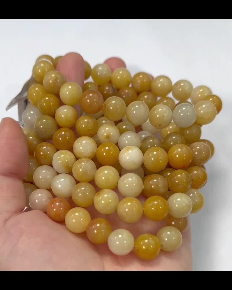 Bransoletka z żółtego jadeitu z koralikami o średnicy 10 mm